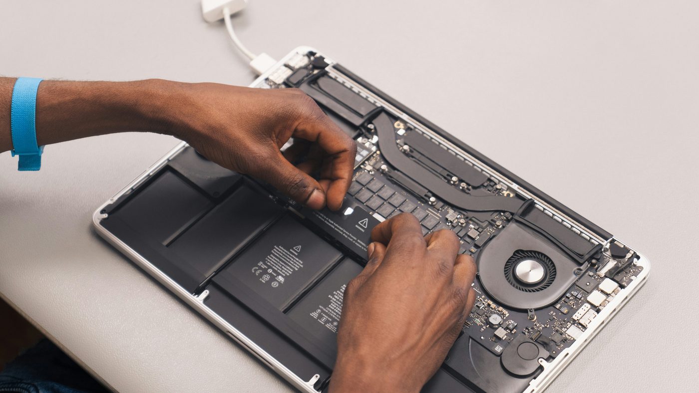 Laptop opened for repair and hardware troubleshooting